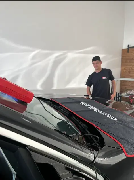 Photo Rapid Pare-Brise Poussan